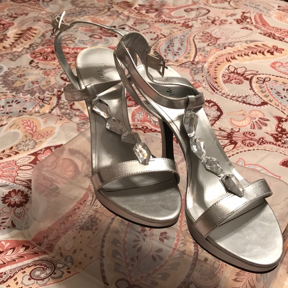 Gorgeous silver high heel shoes.